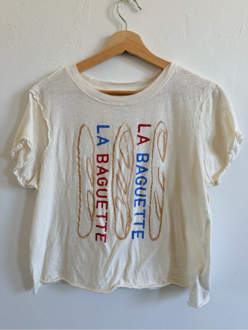 Maeve Cream Graphic Tee with Red and Blue "La Baguette" Print